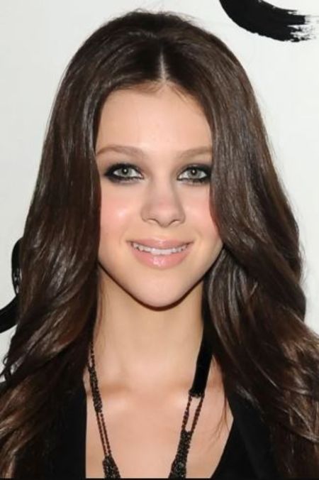 Nicola Peltz in a black dress at Alice Olivia Spring 2011 show in 2010.